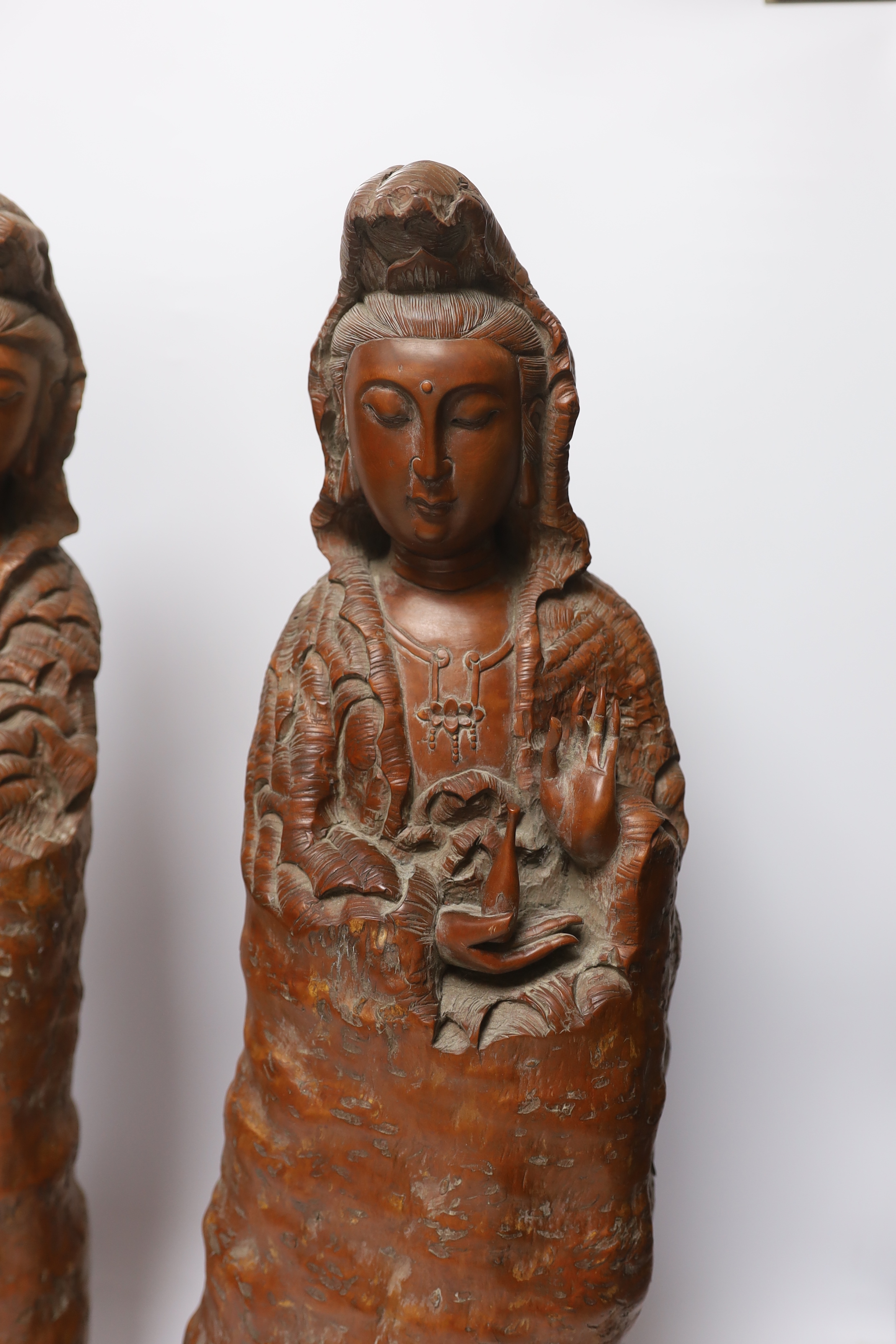 Two large Chinese rootwood figures of Guanyin, 57cm high